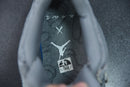 KAWS x Air Jordan 4 Retro Cool Grey